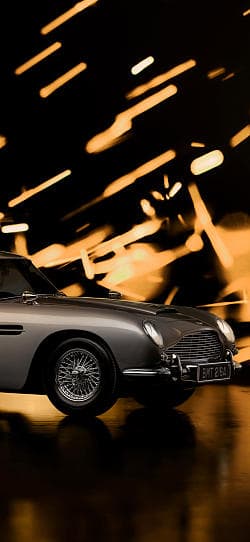 阿斯顿·马丁 DB12 Goldfinger Edition 高清手机竖屏壁纸